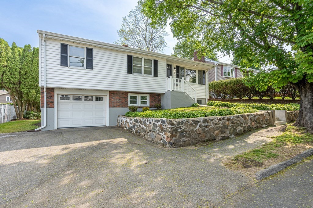 6 Glen Road Peabody, MA 01960 - Photo 32 of 35 front view of a house with a yard