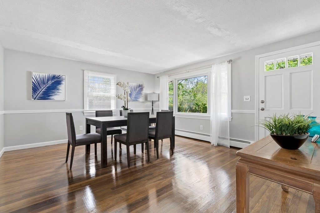 6 Glen Road Peabody, MA 01960 - Photo 8 of 35 a view of a dining room with furniture window and wooden floor
