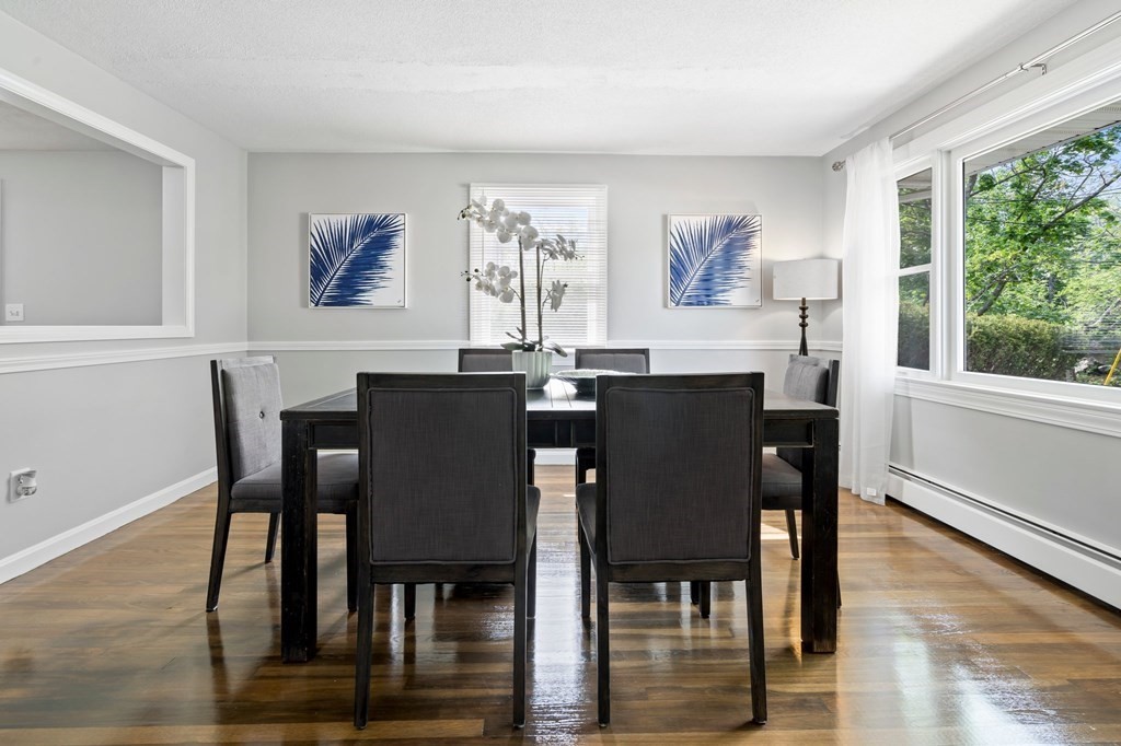 6 Glen Road Peabody, MA 01960 - Photo 9 of 35 a view of a dining room with furniture and wooden floor