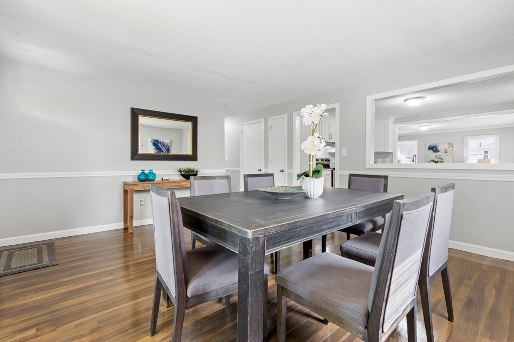 6 Glen Road Peabody, MA 01960 - Photo 10 of 35 a view of a dining room with furniture and wooden floor
