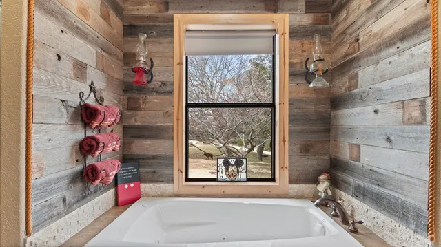 a view of a hallway with dining area