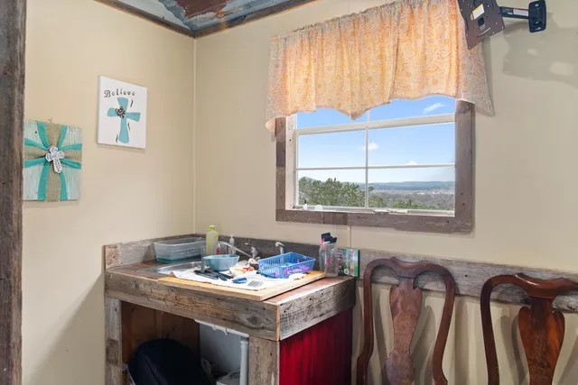 a view of swimming pool with a yard