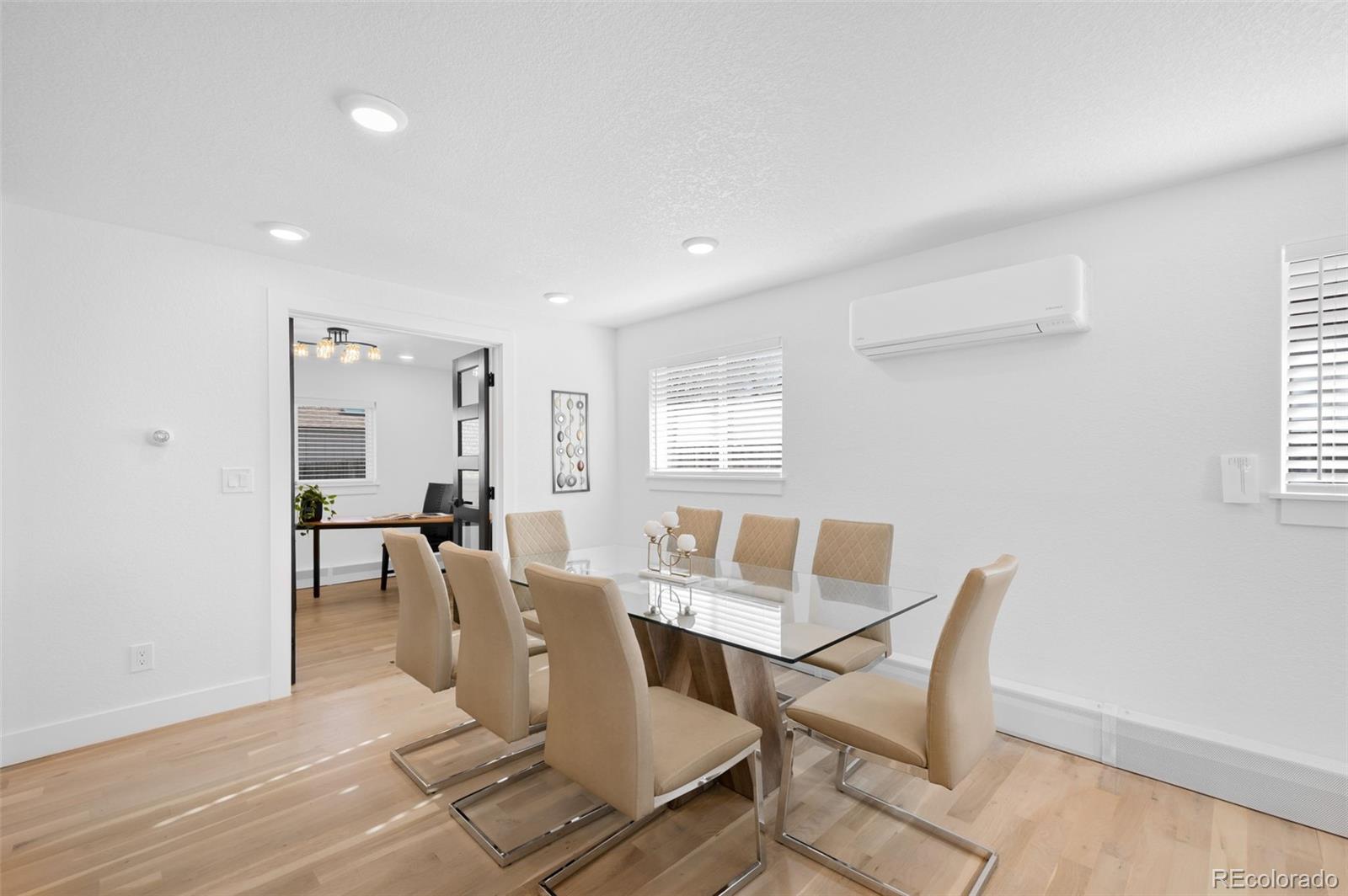 3860 Dudley Street Wheat Ridge, CO 80033 - Photo 13 of 38 a dining room with furniture and window
