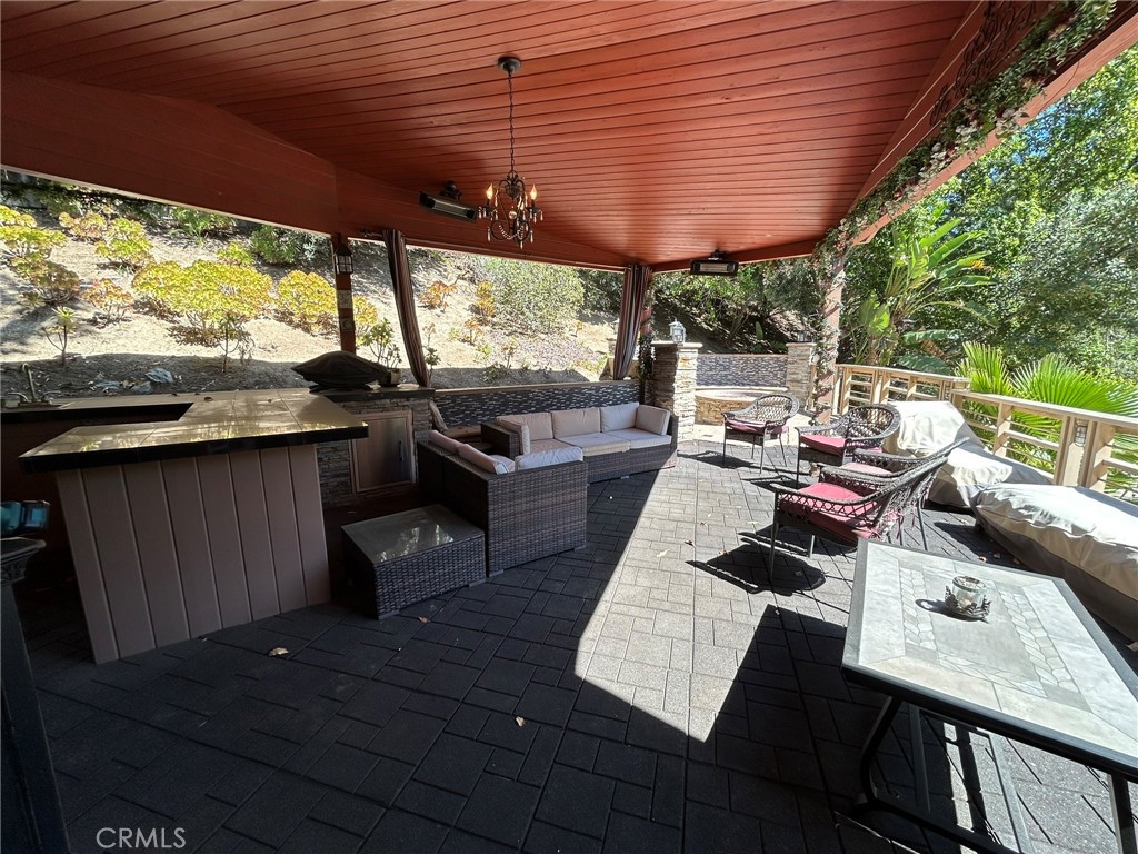 300 South Timken Road Anaheim, CA 92808 - Photo 32 of 40 a view of a patio with a table chairs and a patio