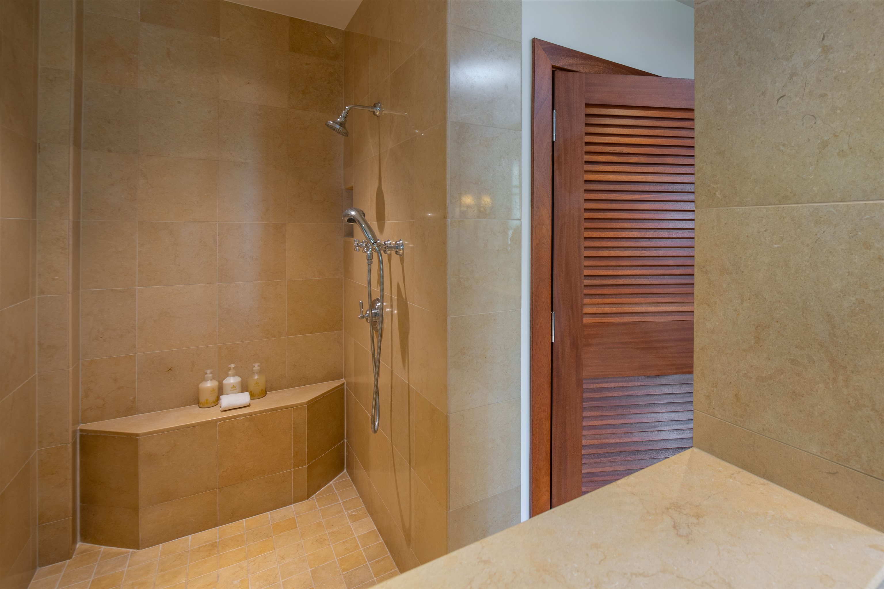 3800 Wailea Alanui Drive, Unit B101 Kihei, HI 96753 - Photo 26 of 50 a bathroom with a bathtub and shower