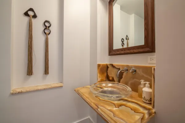 a bathroom with a mirror