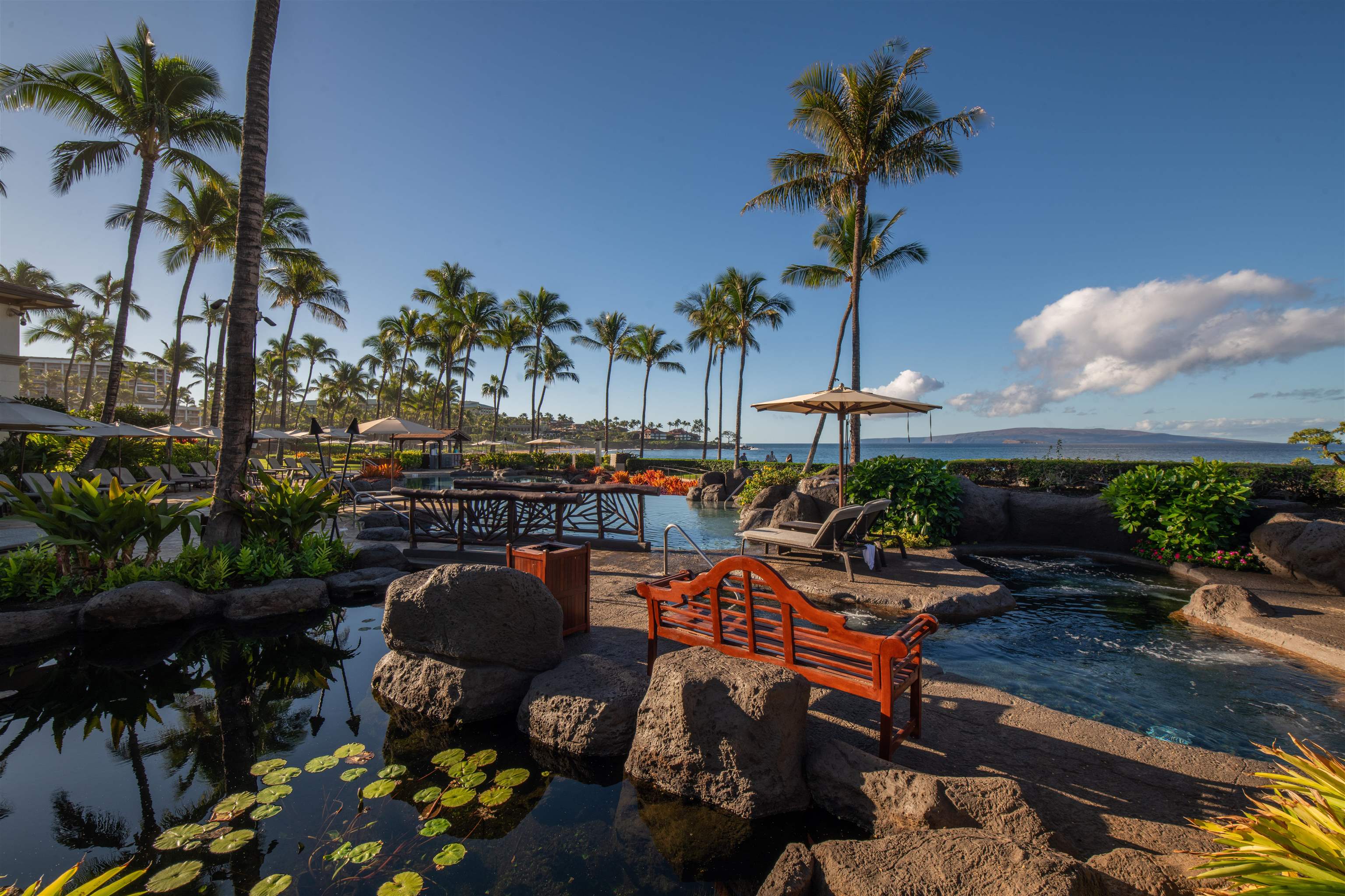 3800 Wailea Alanui Drive, Unit B101 Kihei, HI 96753 - Photo 47 of 50 a view of a chairs and table in patio