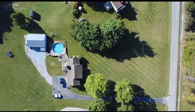 a view of swimming pool with an outdoor space and seating area
