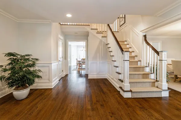 a view of entryway with wooden floor