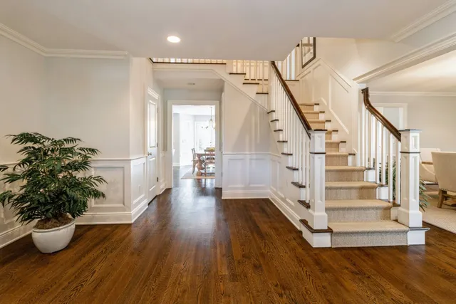a view of entryway with wooden floor