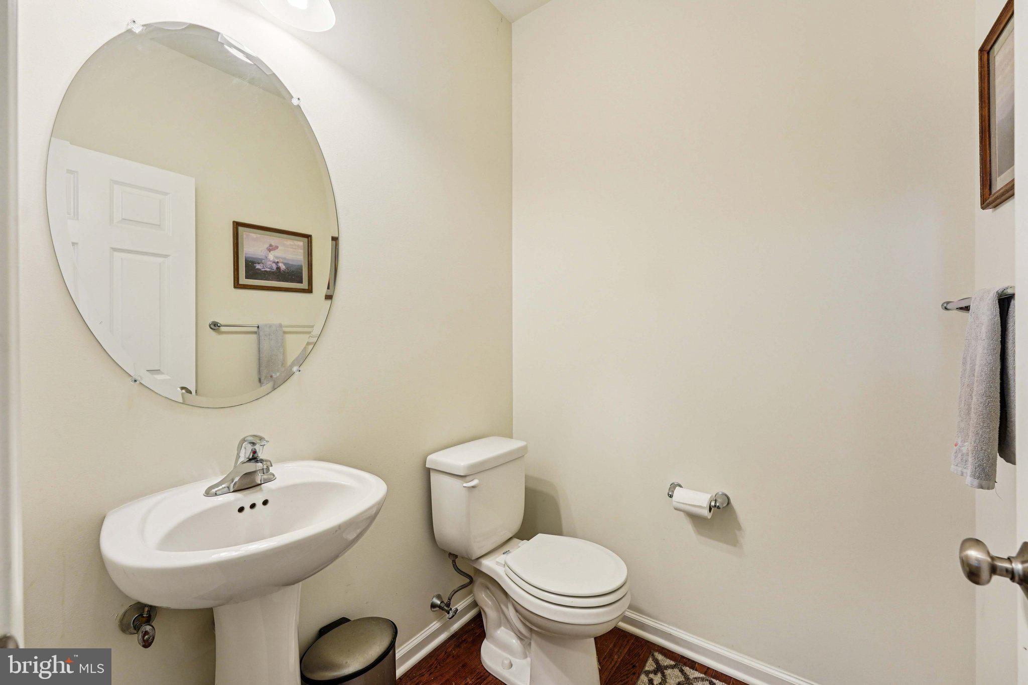 332 Redbud Lane Kennett Square, PA 19348 - Photo 11 of 29 a bathroom with a sink mirror and toilet