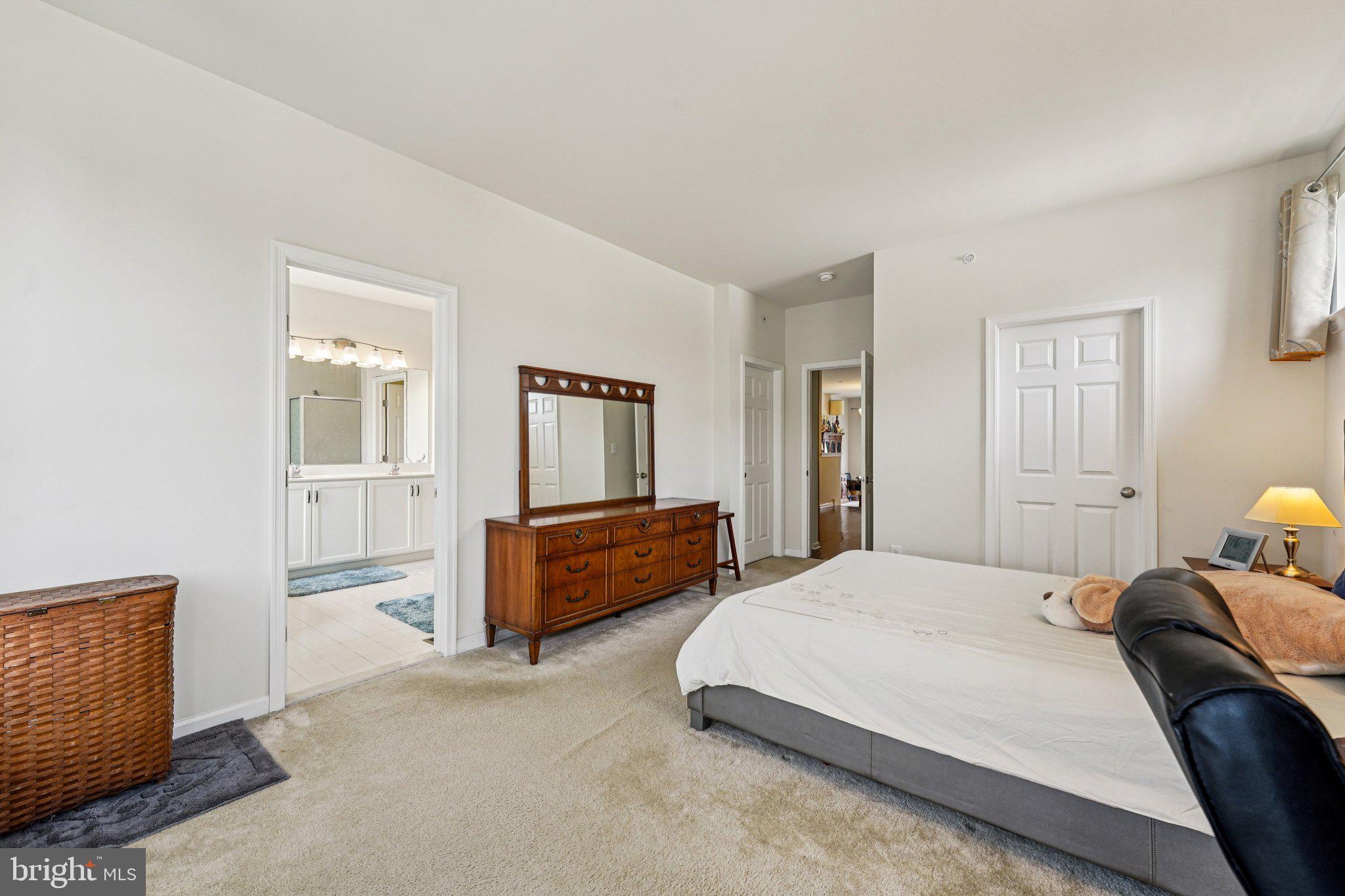 332 Redbud Lane Kennett Square, PA 19348 - Photo 13 of 29 a bedroom with a bed and wooden floor