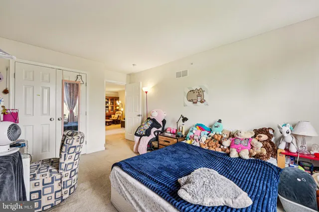 a very nice looking room with a large dining table and a couch