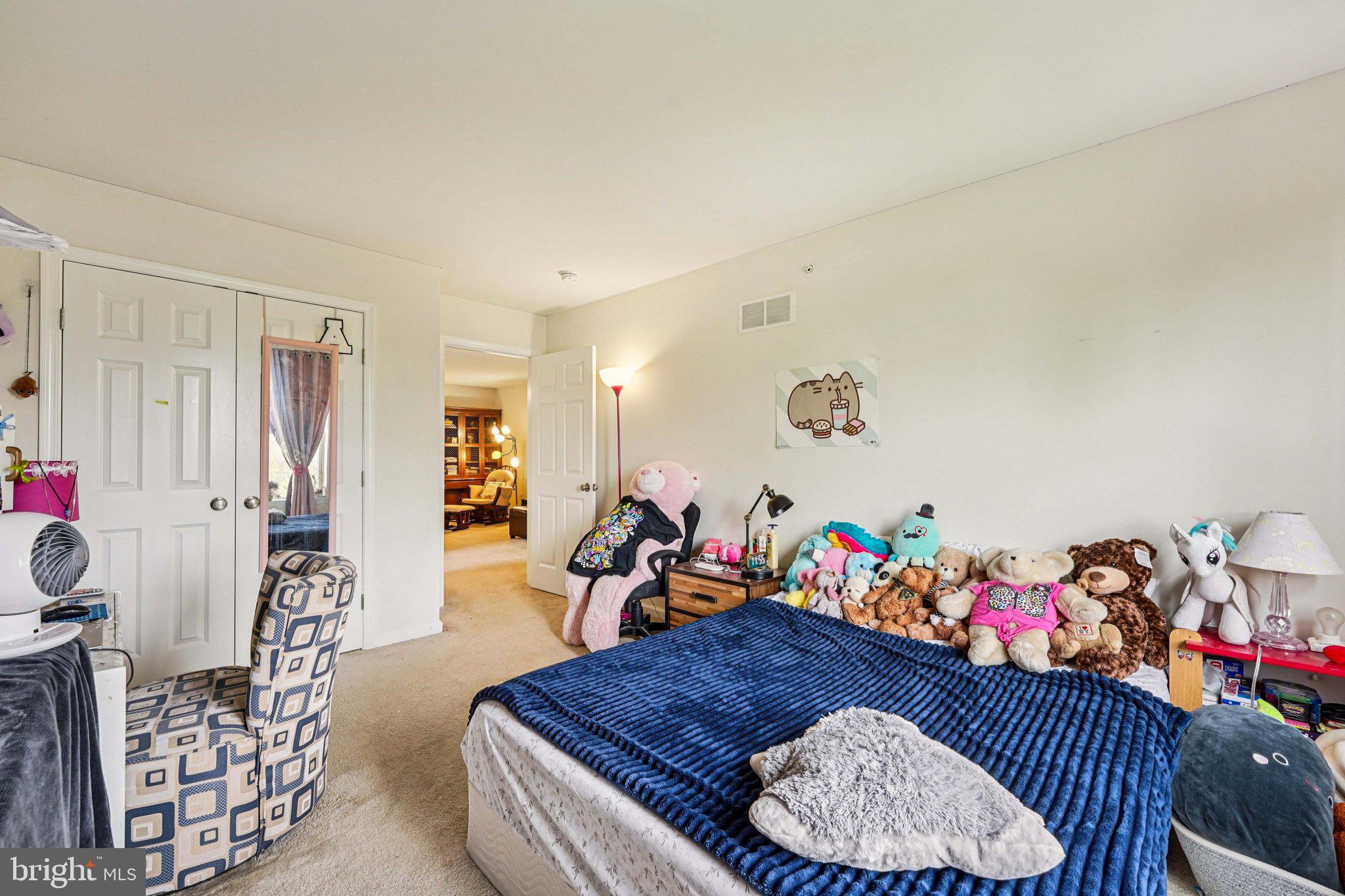 332 Redbud Lane Kennett Square, PA 19348 - Photo 20 of 29 a very nice looking room with a large dining table and a couch