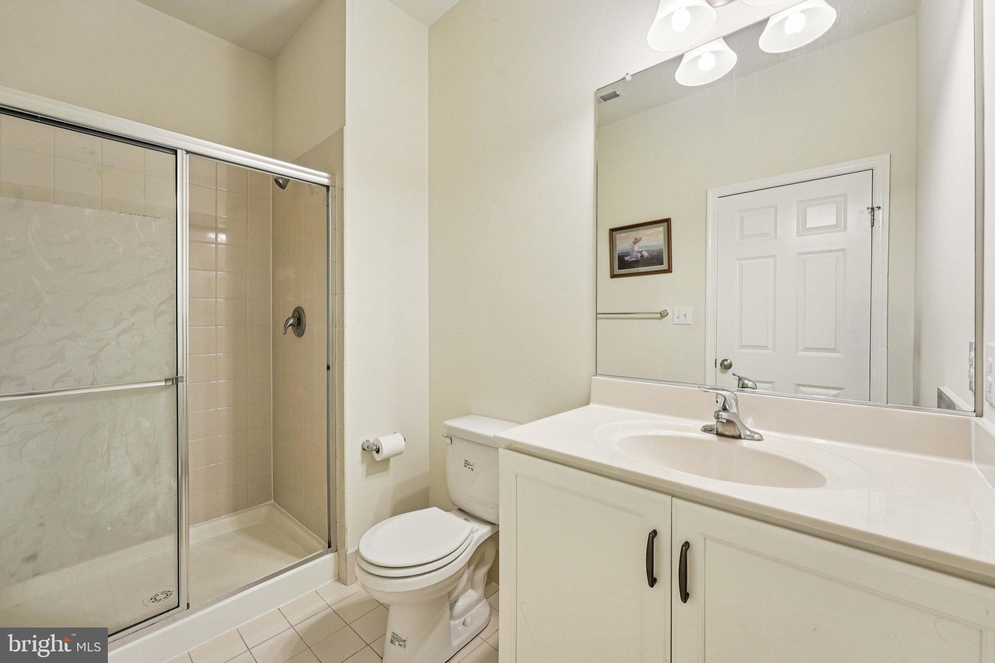 332 Redbud Lane Kennett Square, PA 19348 - Photo 23 of 29 a bathroom with a sink toilet and shower