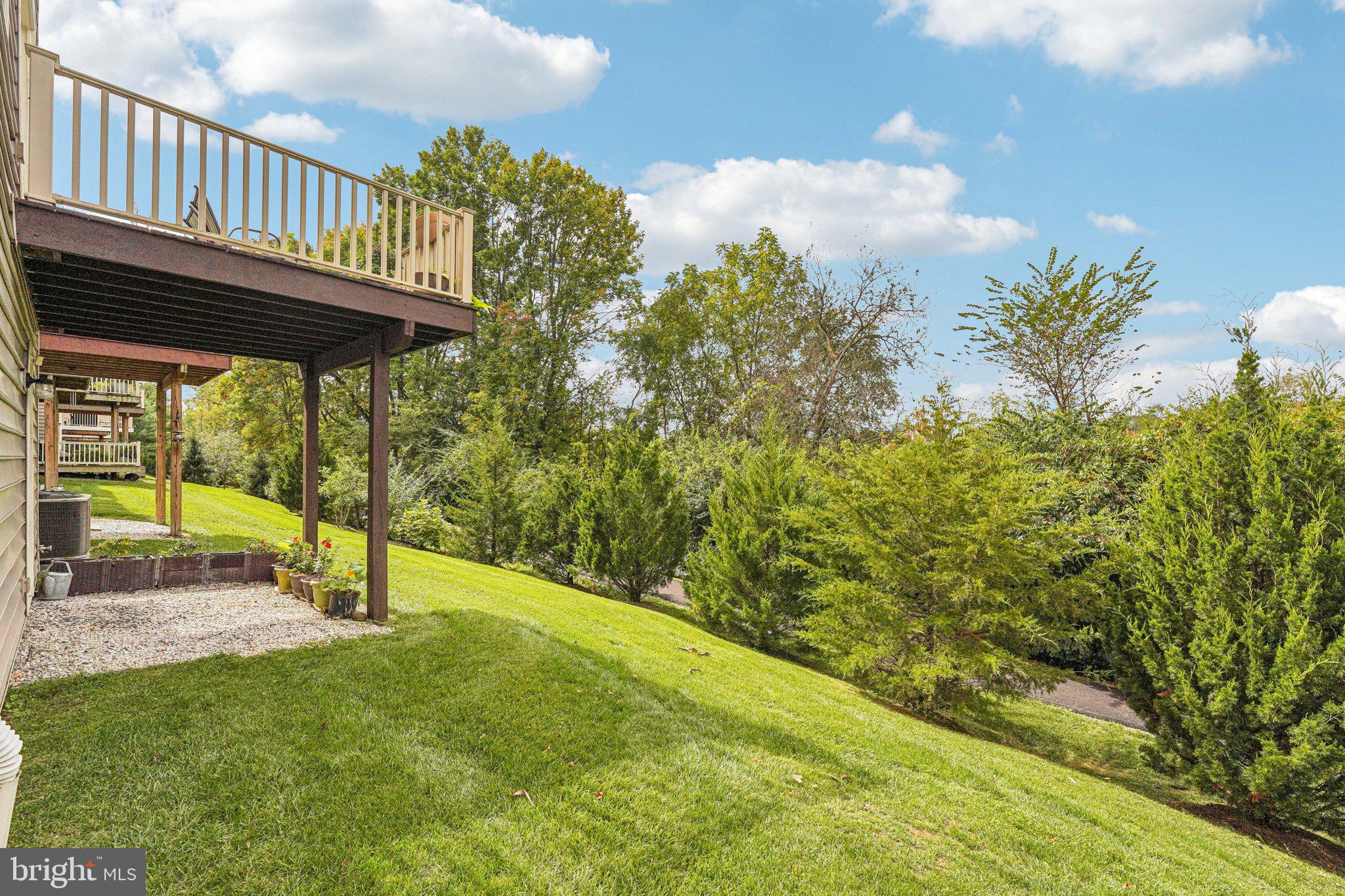 332 Redbud Lane Kennett Square, PA 19348 - Photo 25 of 29 a view of a chair and table in the garden