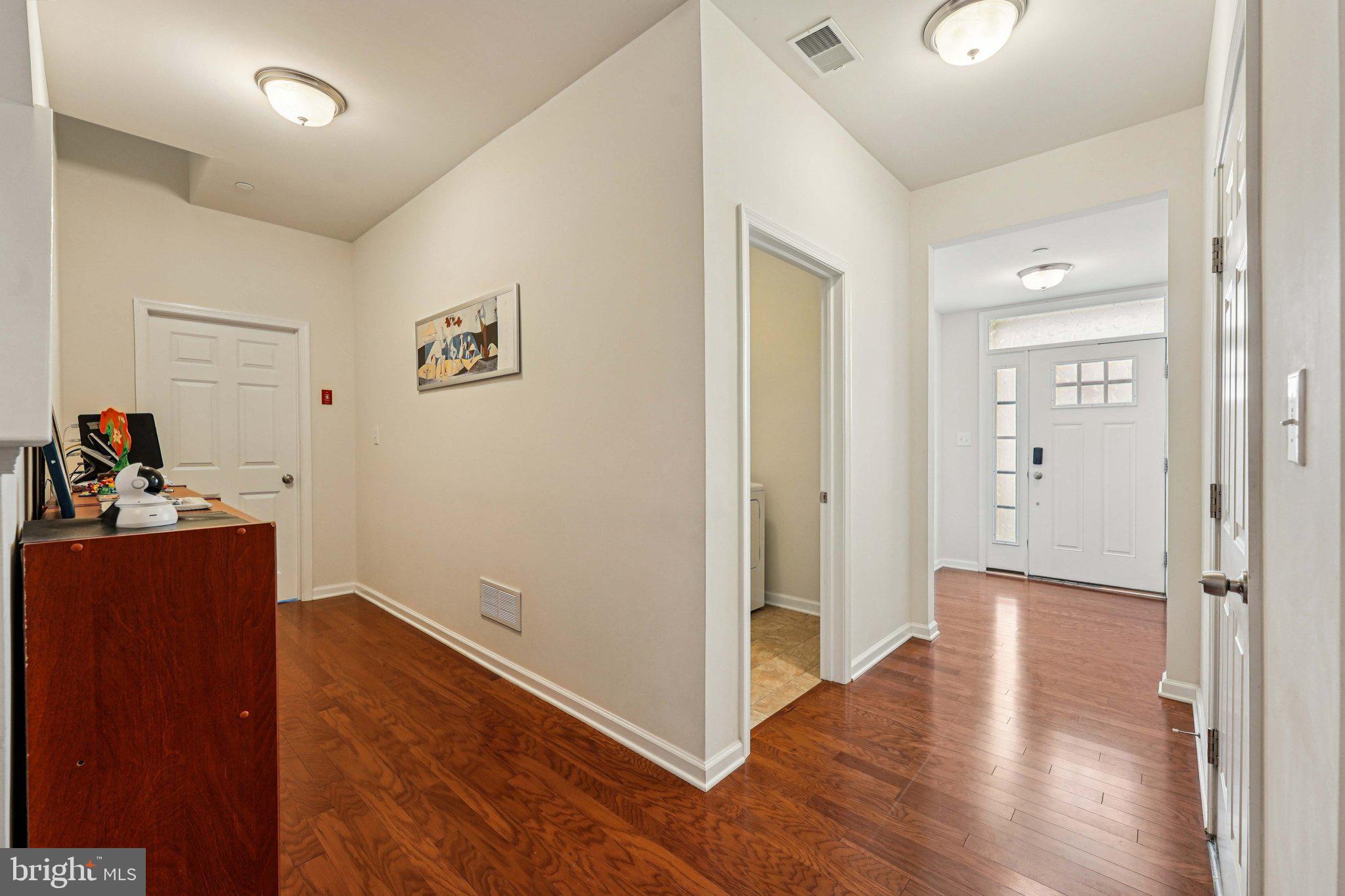 332 Redbud Lane Kennett Square, PA 19348 - Photo 4 of 29 a view of a hallway with wooden floor