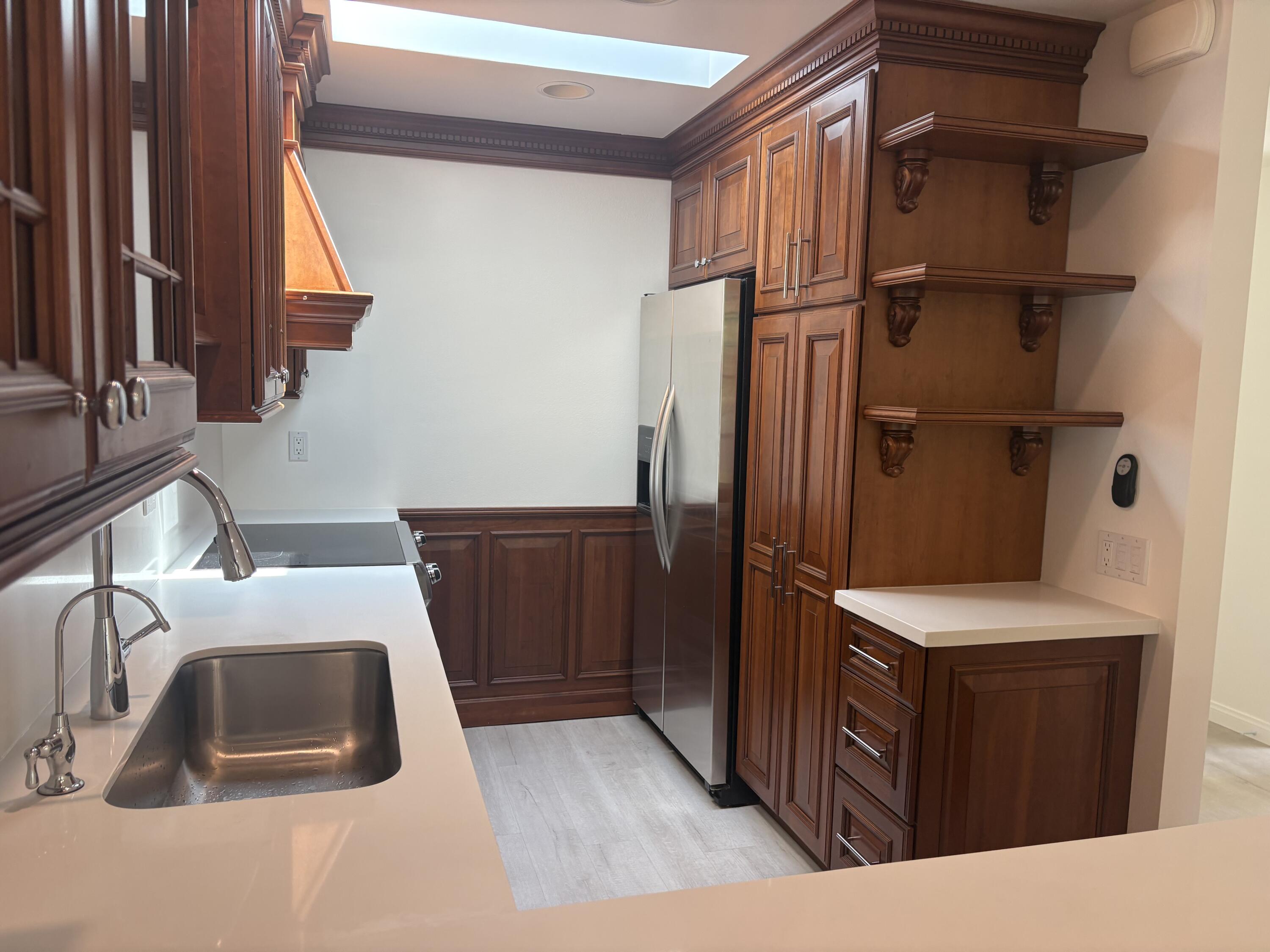 1220 Coast Village Road, Unit 304 Santa Barbara, CA 93108 - Photo 7 of 17 kitchen showing fridge