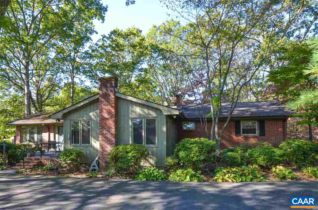 front view of a house with a garden