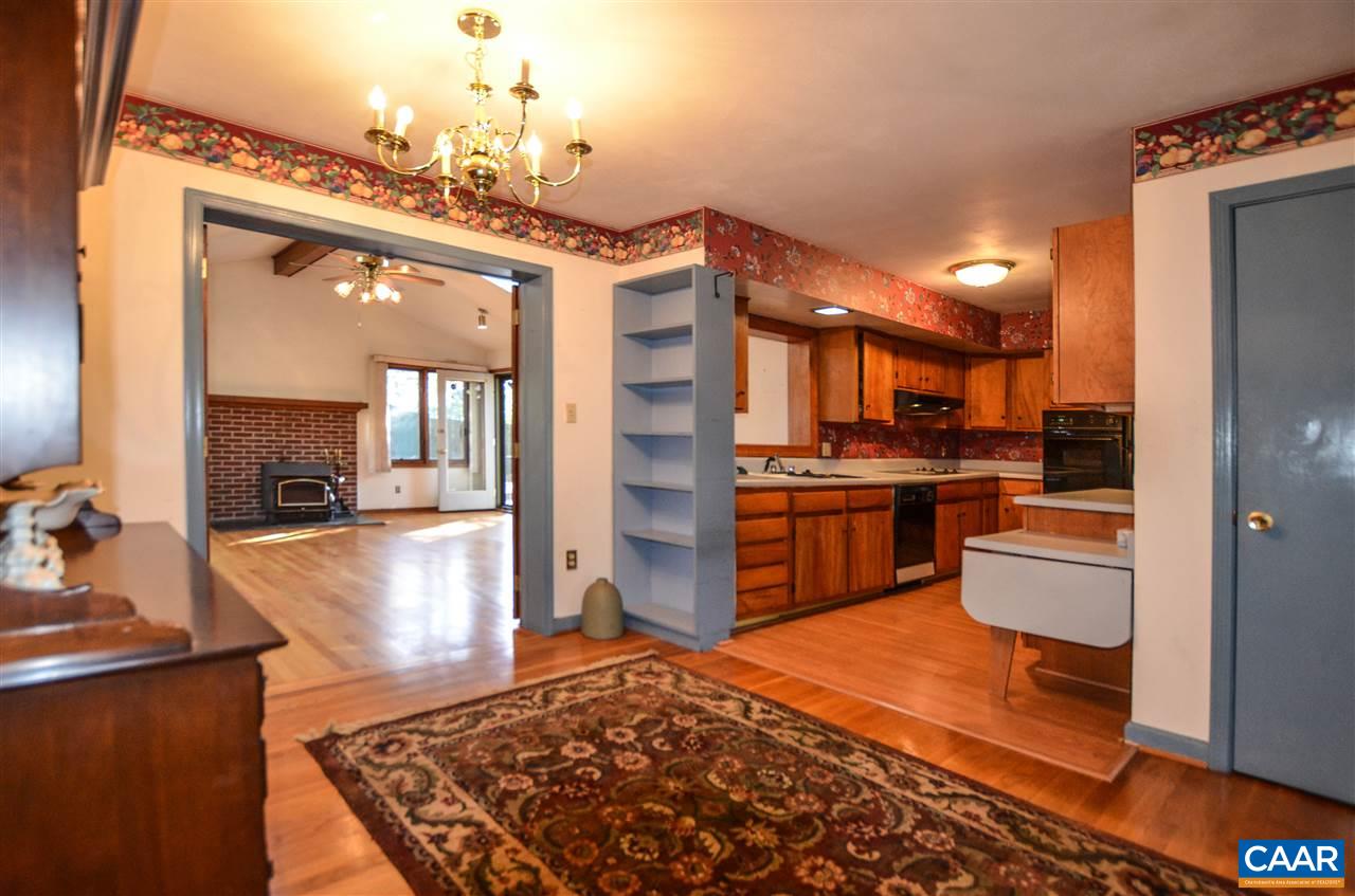 5770 Willow Spring Road Crozet, VA 22932 - Photo 20 of 49 a kitchen with a refrigerator and a stove top oven