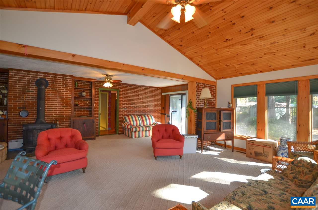 5770 Willow Spring Road Crozet, VA 22932 - Photo 25 of 49 a outdoor living space with furniture and large window