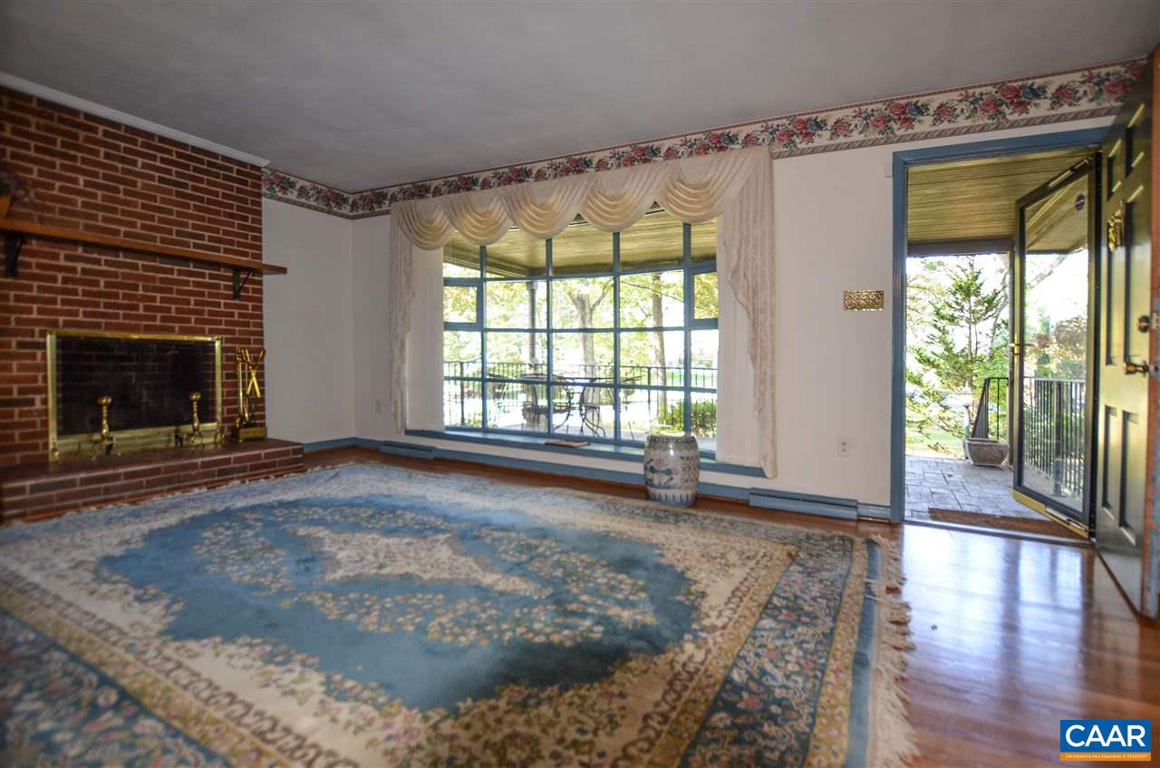 5770 Willow Spring Road Crozet, VA 22932 - Photo 30 of 49 a view of an empty room with window and wooden floor