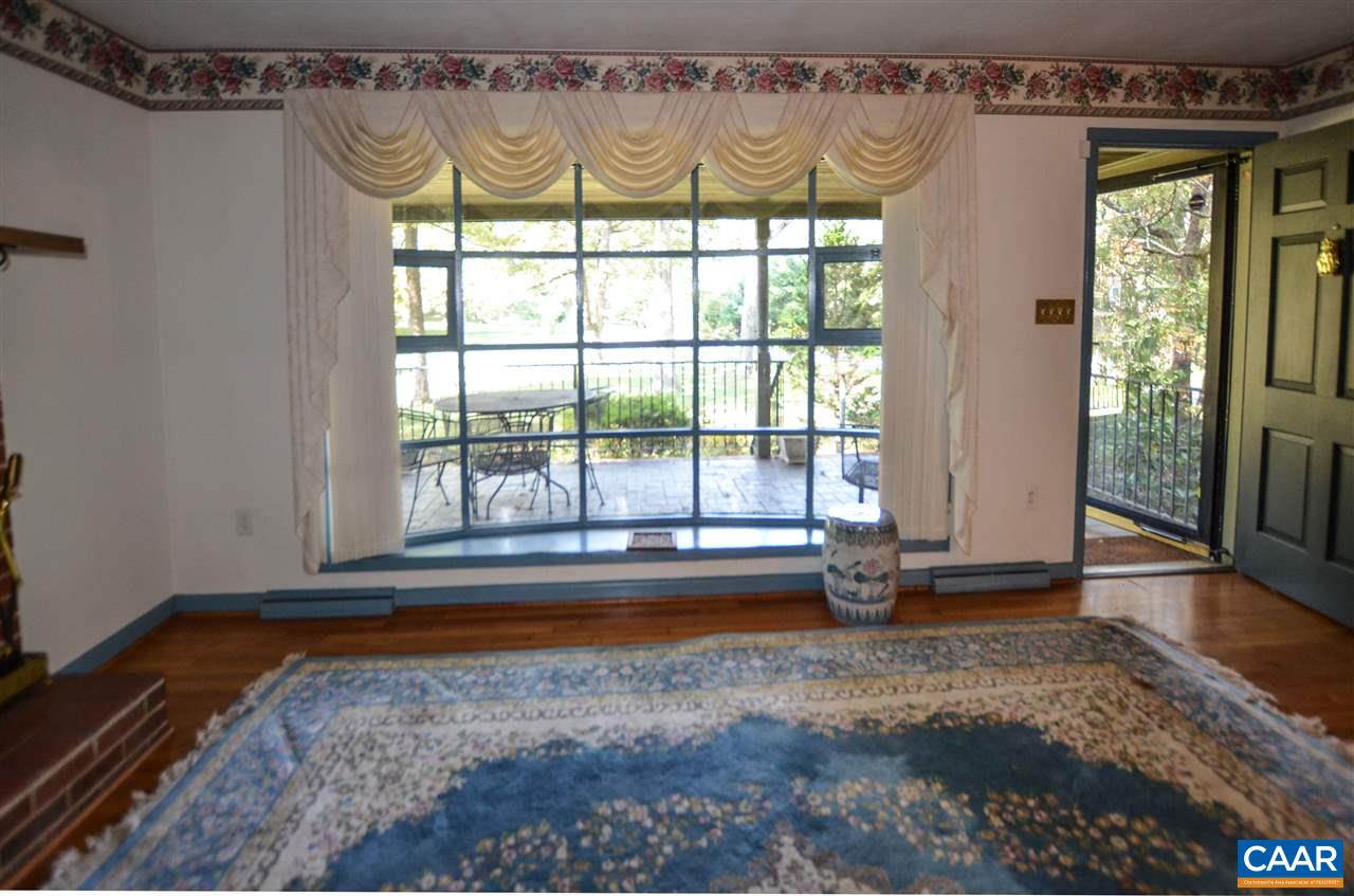 5770 Willow Spring Road Crozet, VA 22932 - Photo 31 of 49 a view of a room with wooden floor and a tub