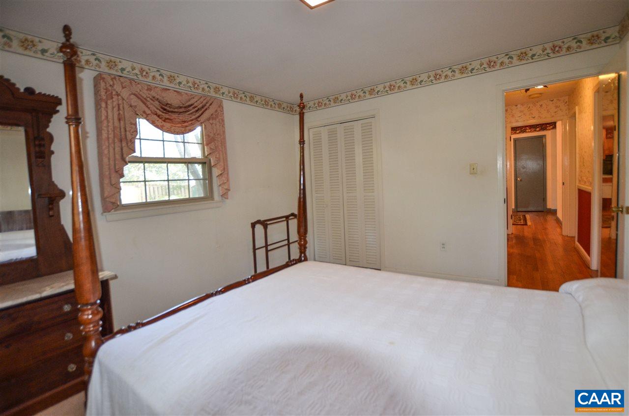 5770 Willow Spring Road Crozet, VA 22932 - Photo 39 of 49 a bedroom with a bed and a window