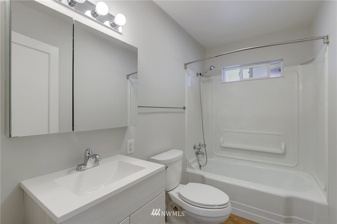 340 Wells Avenue North Renton, WA 98057 - Photo 13 of 23 a bathroom with a sink toilet and shower