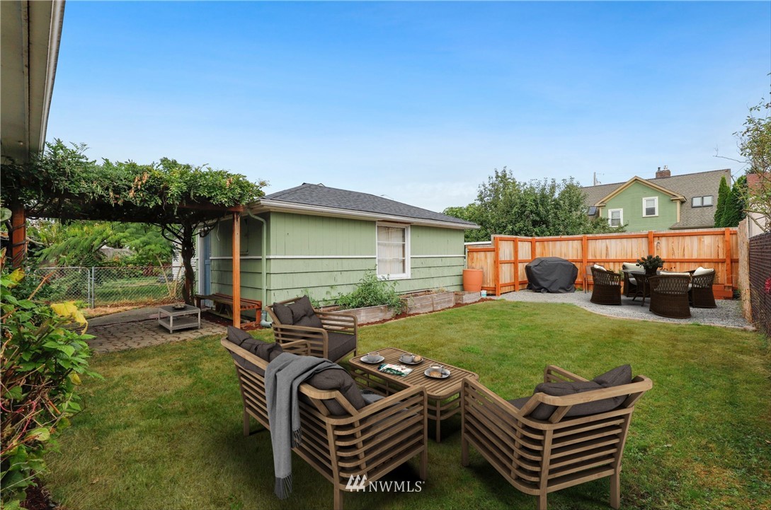 340 Wells Avenue North Renton, WA 98057 - Photo 17 of 23 a view of a backyard with sitting area