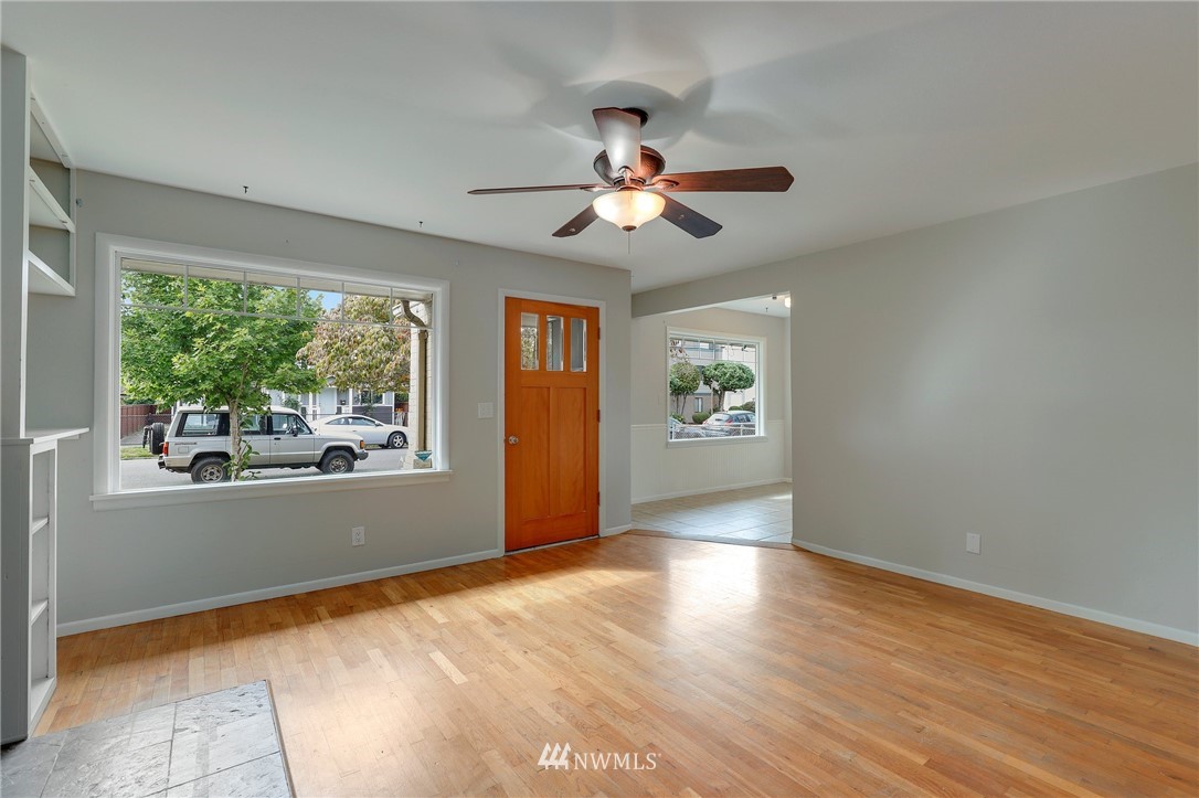 340 Wells Avenue North Renton, WA 98057 - Photo 5 of 23 a view of empty room with wooden floor and fan