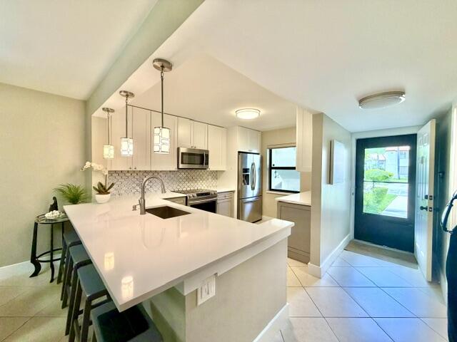 22148 Palms Way, Unit 101 Boca Raton, FL 33433 - Photo 7 of 41 Plenty of stool space
