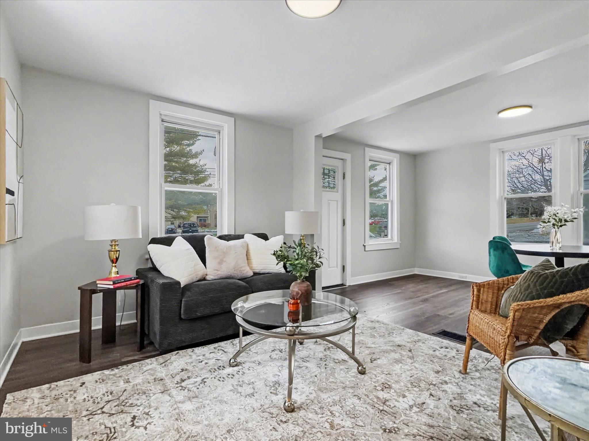 744 Forge Road Carlisle, PA 17015 - Photo 16 of 22 a living room with furniture a rug and a window