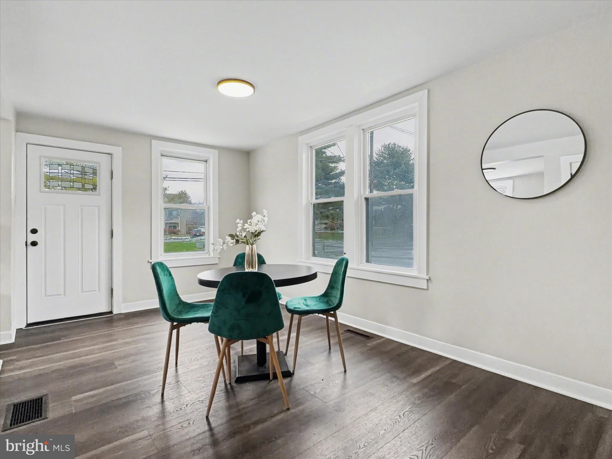 744 Forge Road Carlisle, PA 17015 - Photo 17 of 22 a view of a dining room with furniture and wooden floor