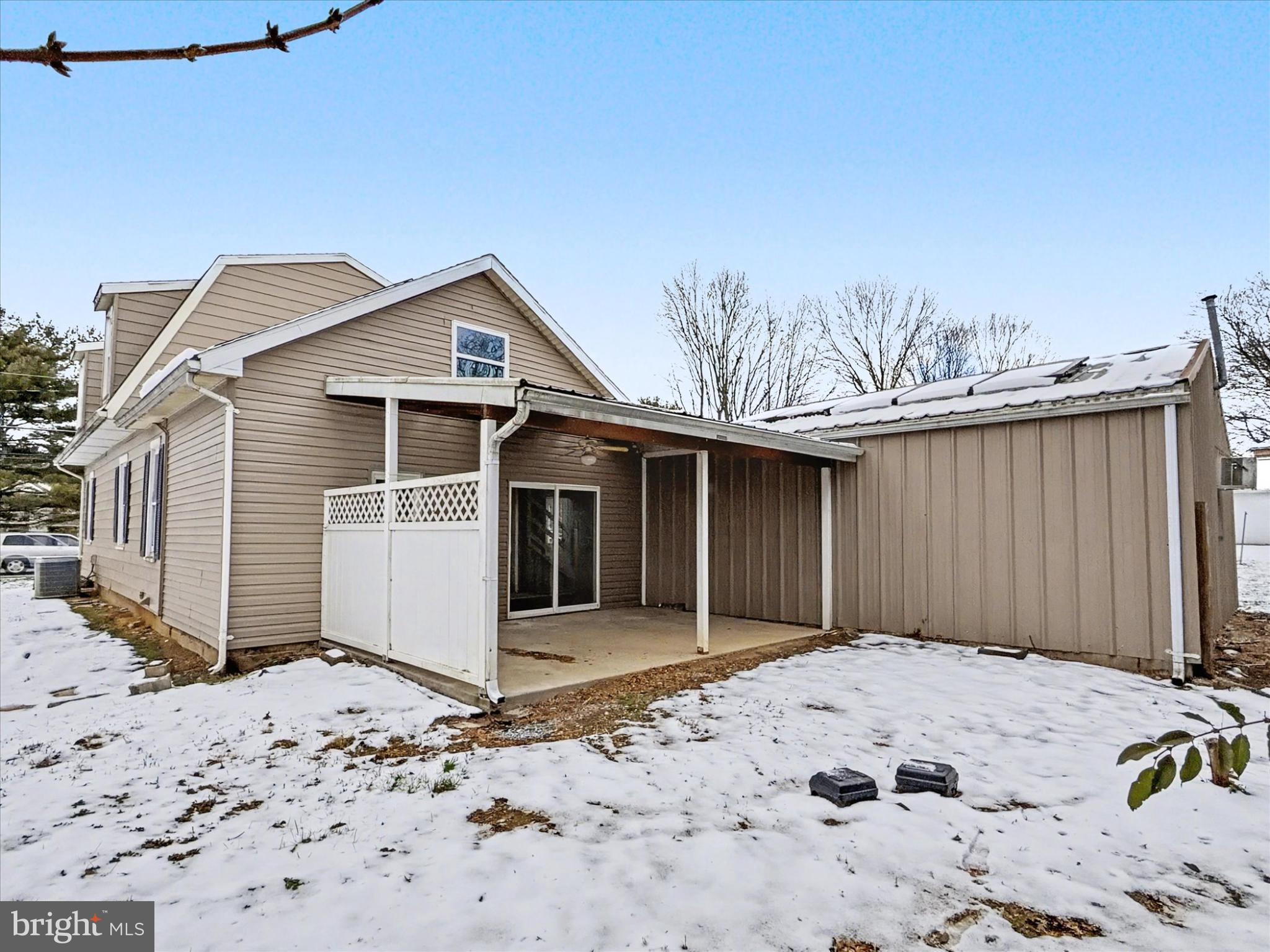 744 Forge Road Carlisle, PA 17015 - Photo 22 of 22 a front view of a house with a yard and garage