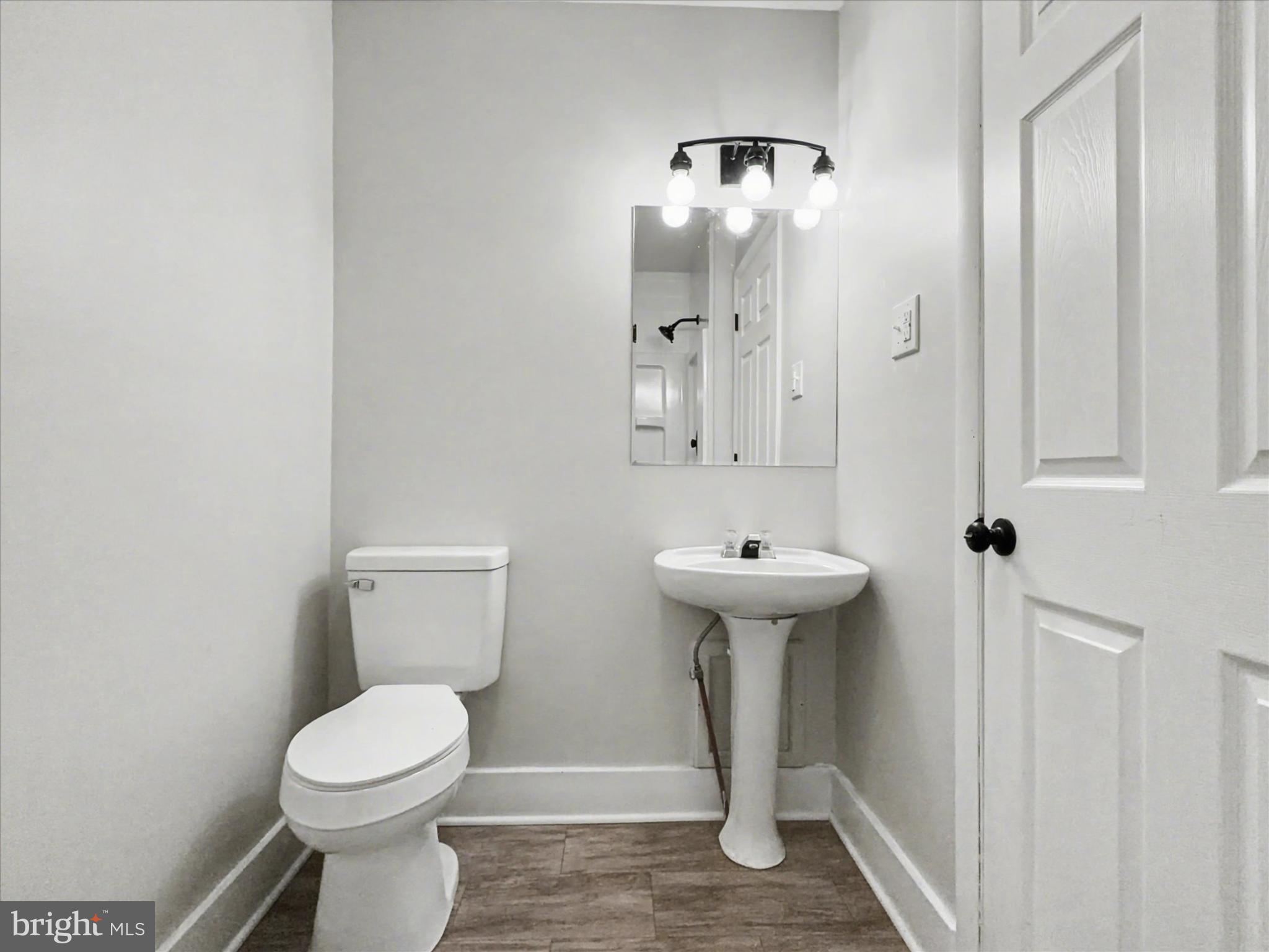 744 Forge Road Carlisle, PA 17015 - Photo 5 of 22 a bathroom with a sink toilet and a mirror