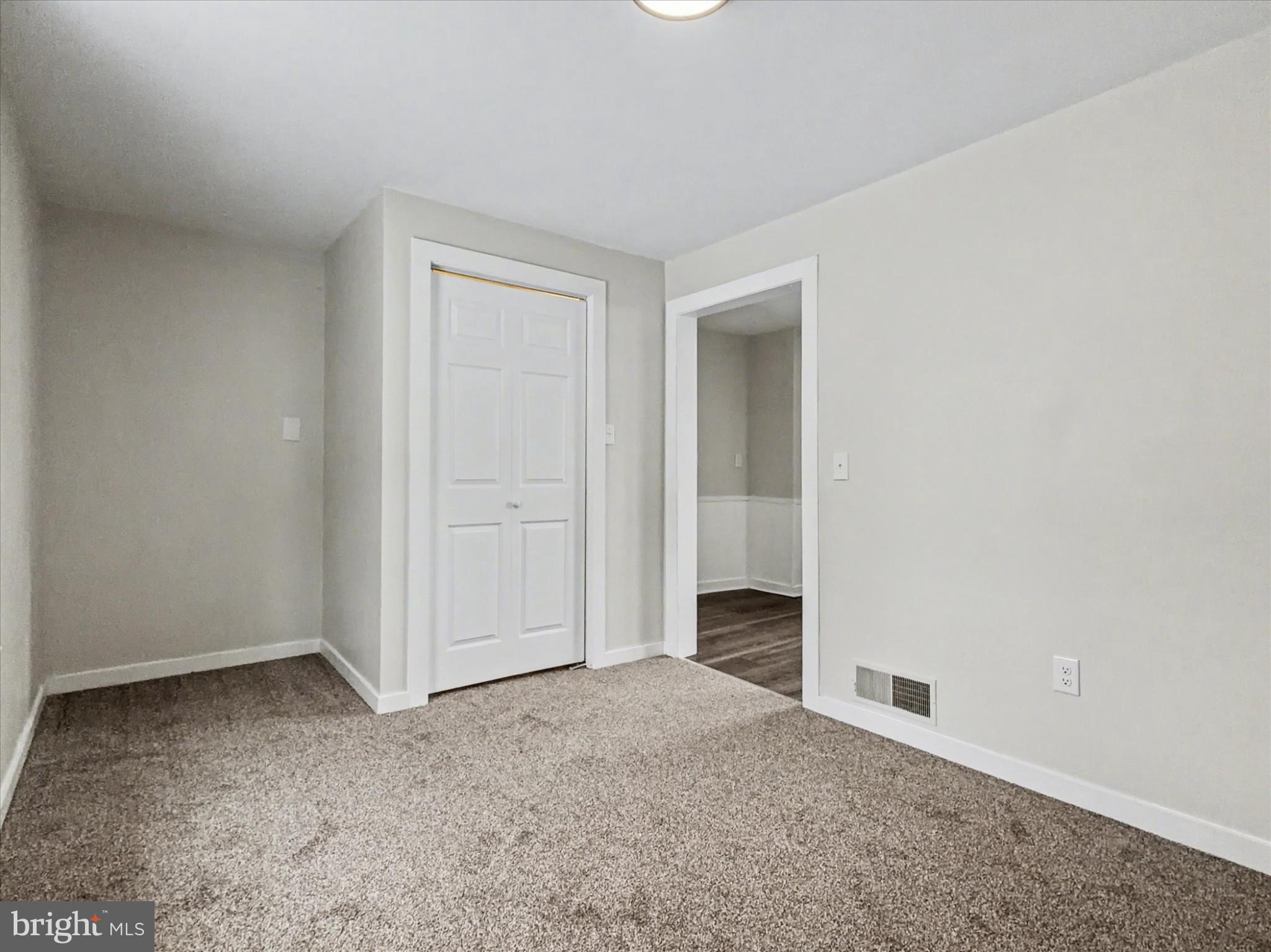 744 Forge Road Carlisle, PA 17015 - Photo 7 of 22 an empty room with an entryway