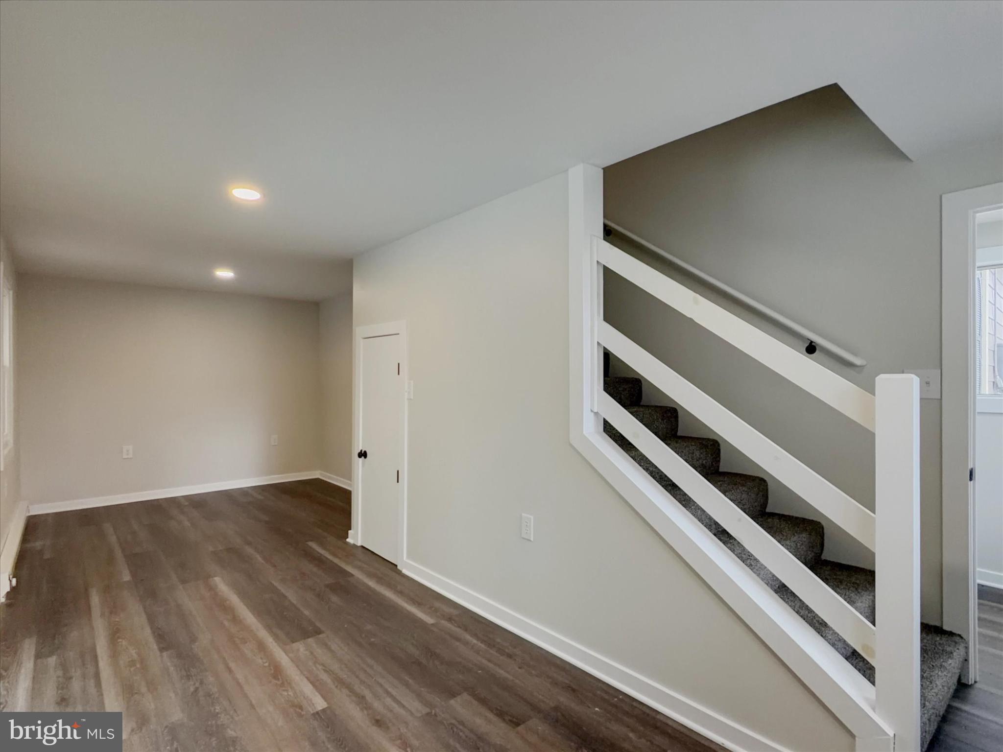 744 Forge Road Carlisle, PA 17015 - Photo 8 of 22 a view of an empty room and wooden floor