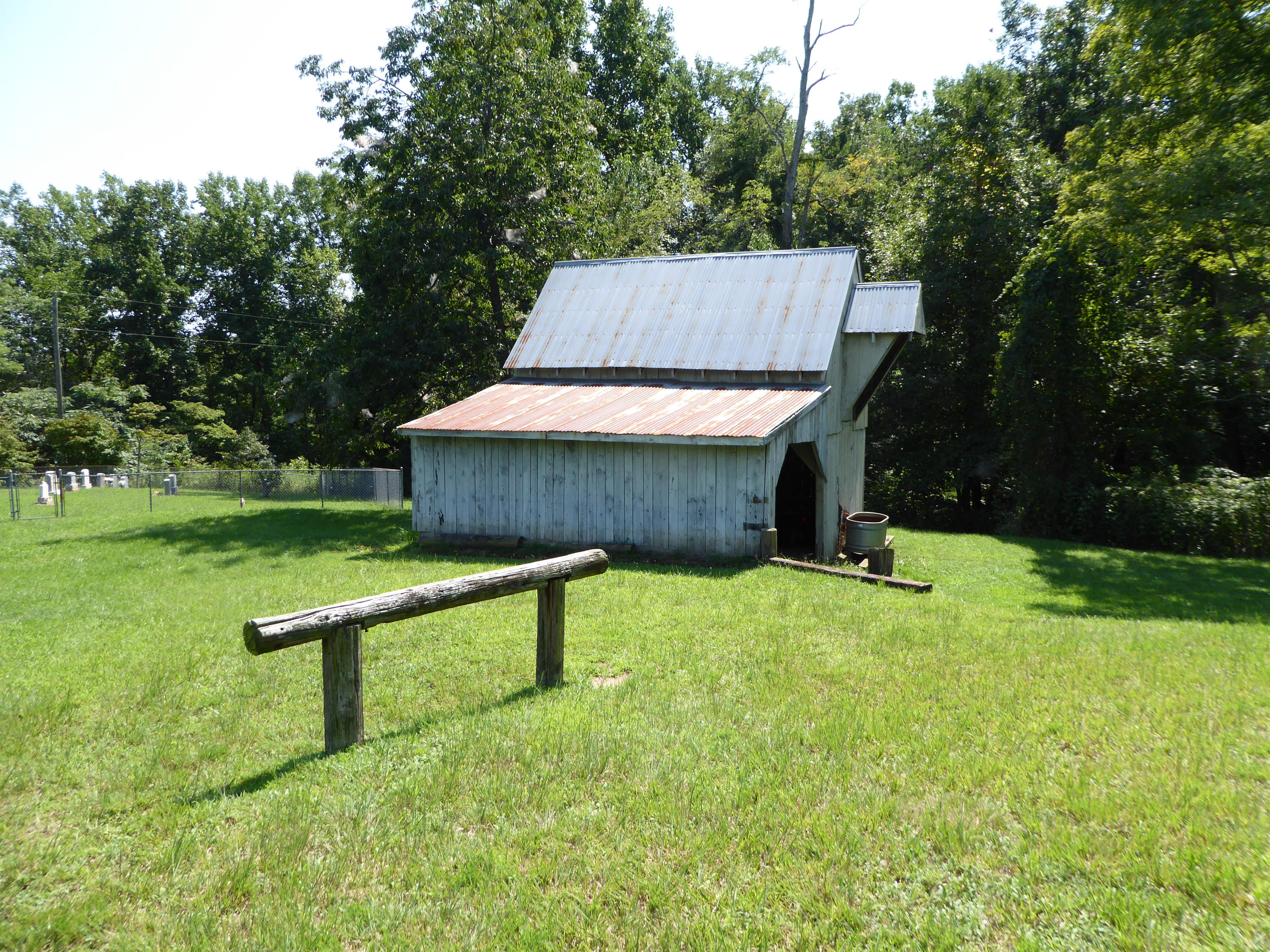 500 Hurds Branch Road Ferrum, VA 24088 - Photo 11 of 60 a view of a backyard with a small cabin