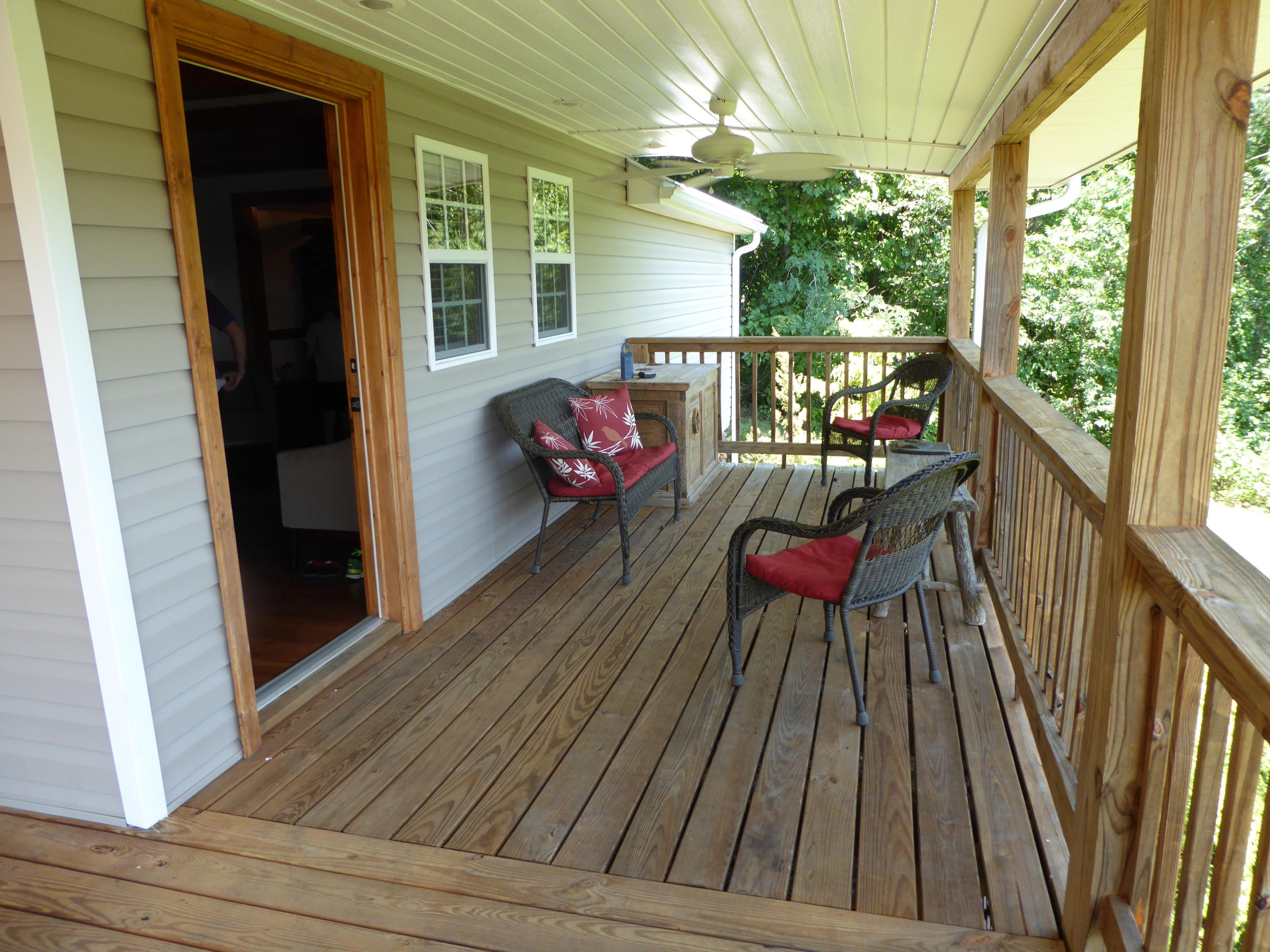 500 Hurds Branch Road Ferrum, VA 24088 - Photo 17 of 60 a balcony with furniture and potted plants