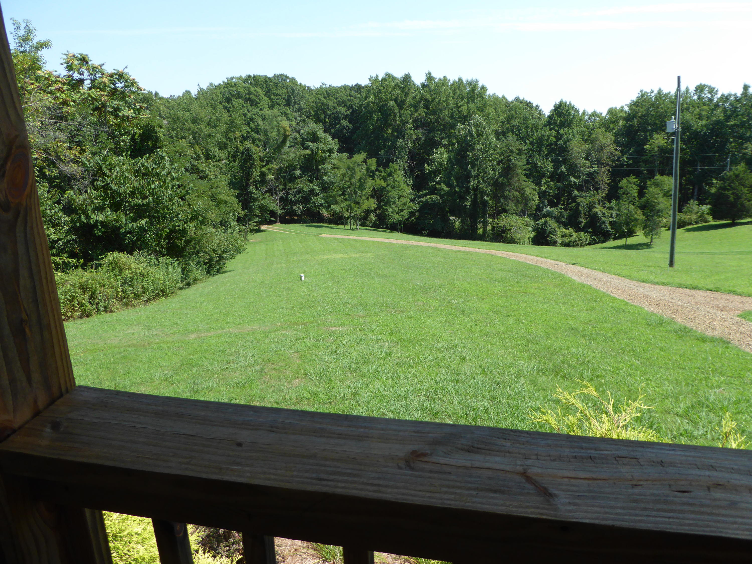 500 Hurds Branch Road Ferrum, VA 24088 - Photo 19 of 60 a wooden bench sitting in the middle of a park