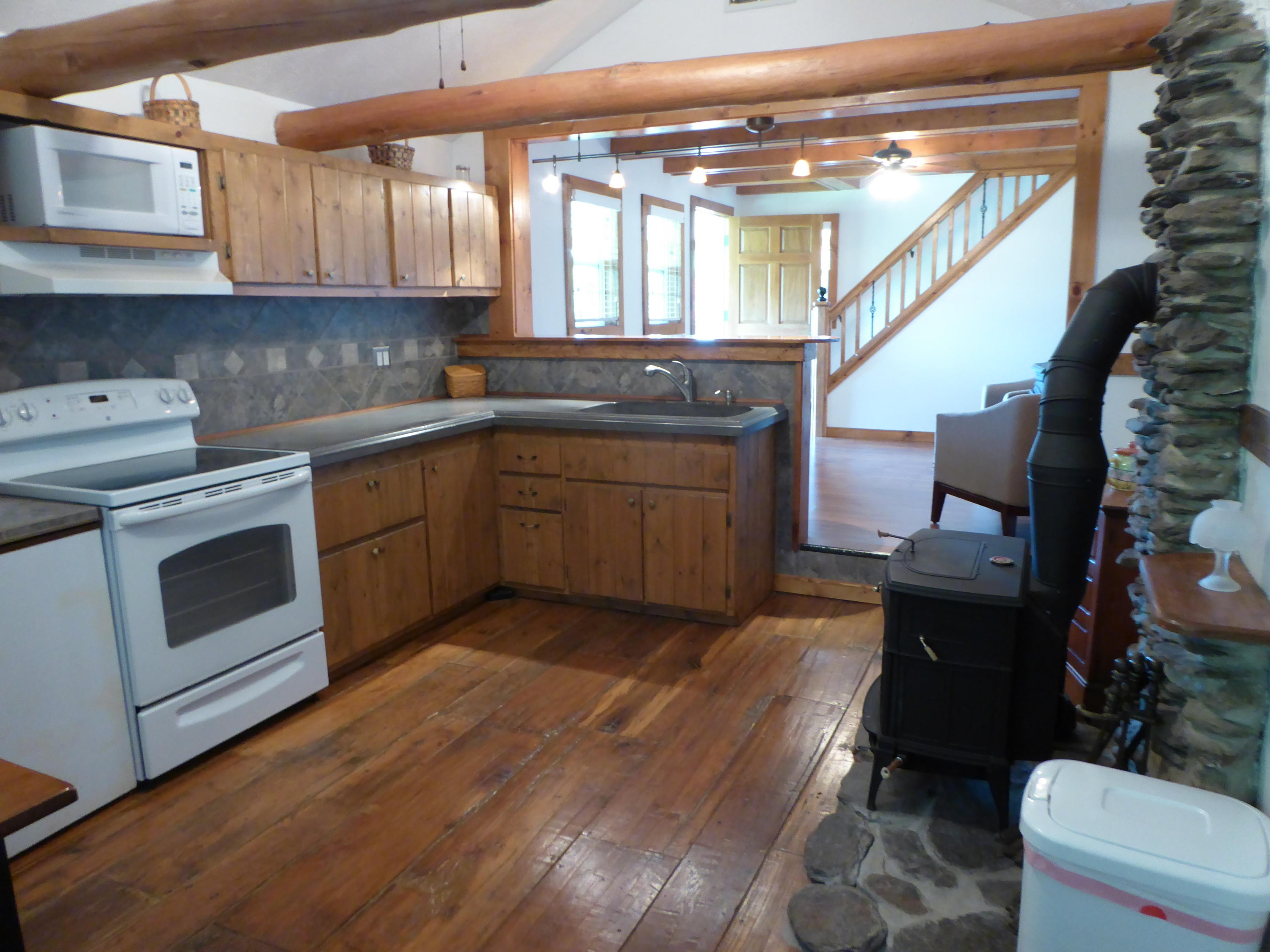 500 Hurds Branch Road Ferrum, VA 24088 - Photo 23 of 60 a kitchen with a sink cabinets appliances and a window