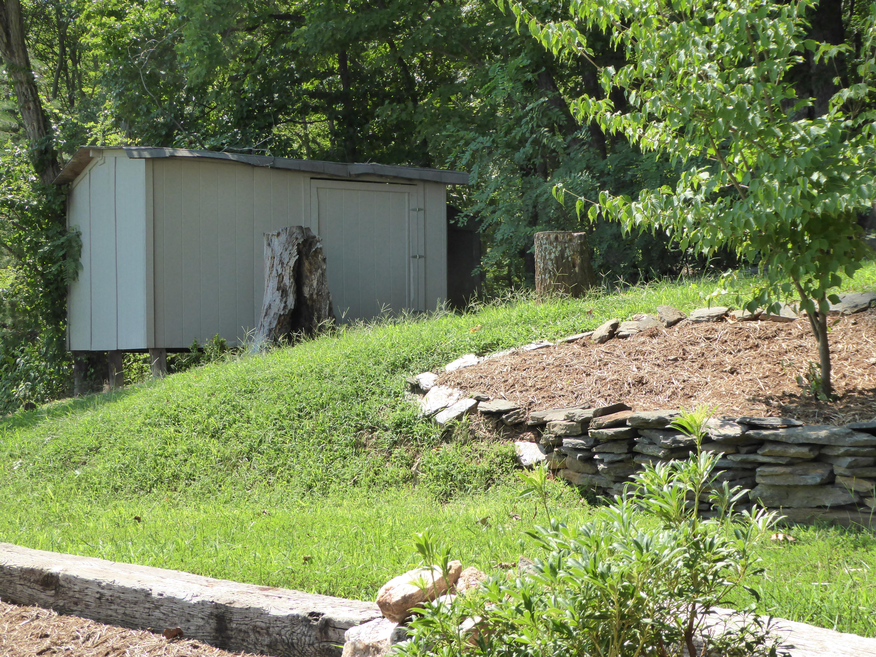 500 Hurds Branch Road Ferrum, VA 24088 - Photo 40 of 60 a backyard of a house with a yard and outdoor seating