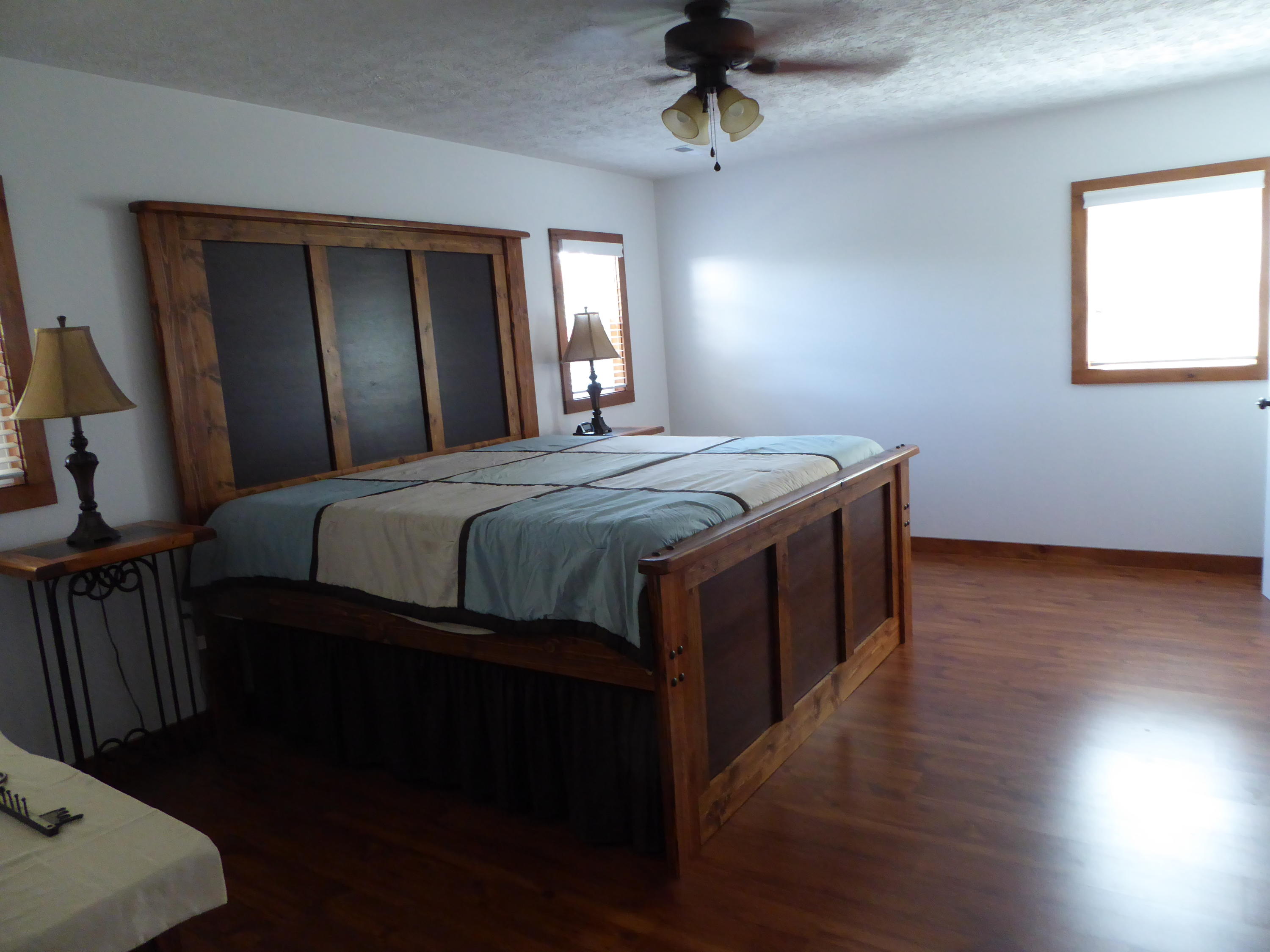 500 Hurds Branch Road Ferrum, VA 24088 - Photo 5 of 60 a bedroom with a bed and a mirror