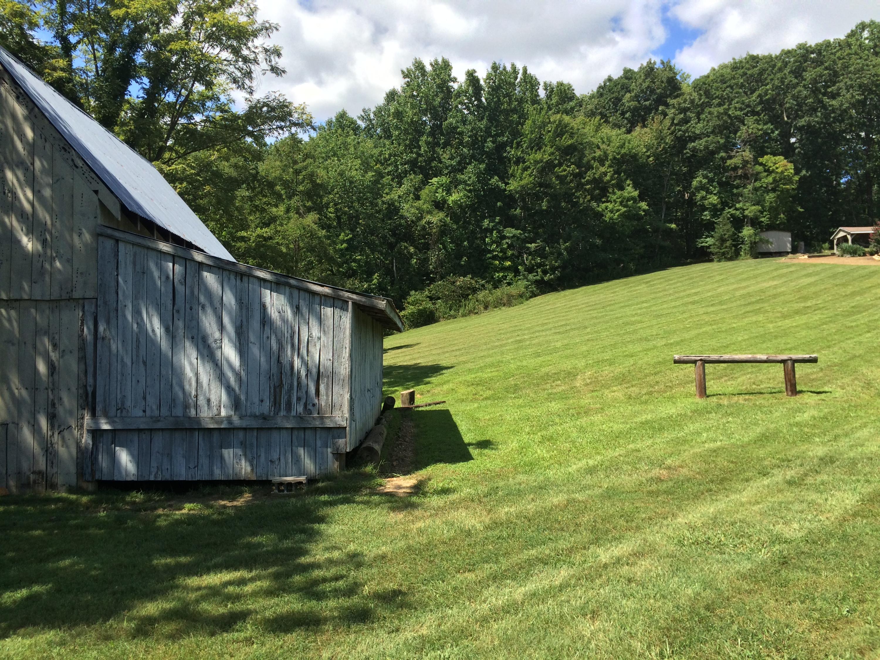 500 Hurds Branch Road Ferrum, VA 24088 - Photo 57 of 60 a backyard of a house with lots of green space