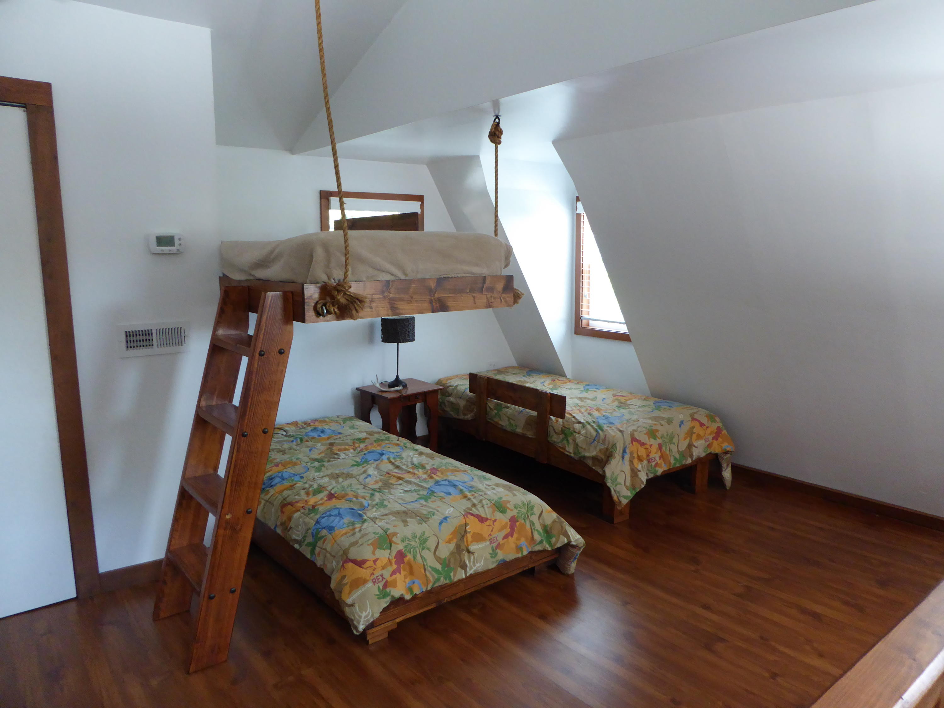 500 Hurds Branch Road Ferrum, VA 24088 - Photo 8 of 60 a bedroom with bed and wooden floor
