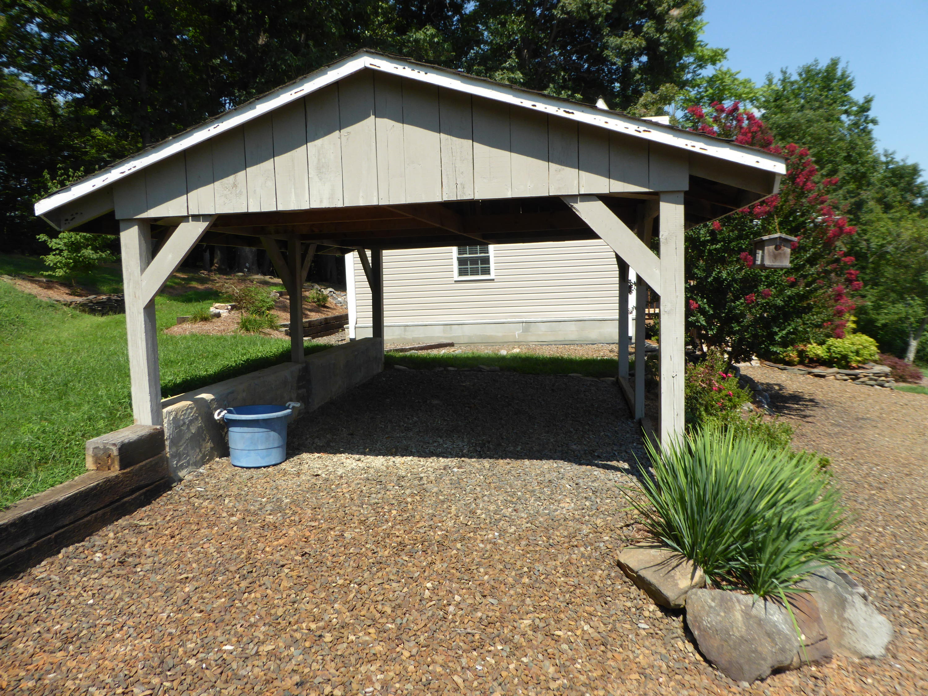 500 Hurds Branch Road Ferrum, VA 24088 - Photo 10 of 60 a view of a small house with roof deck front of house
