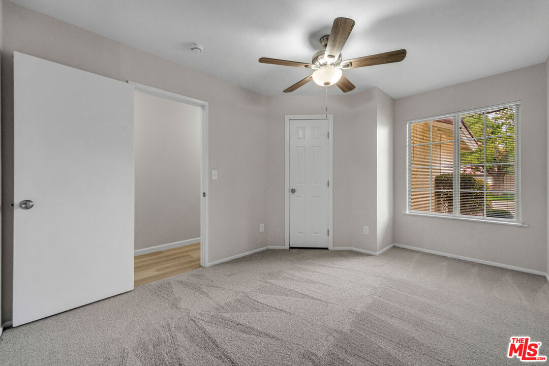 716 East E Avenue Lancaster, CA 93535 - Photo 13 of 17 a view of an empty room with a window