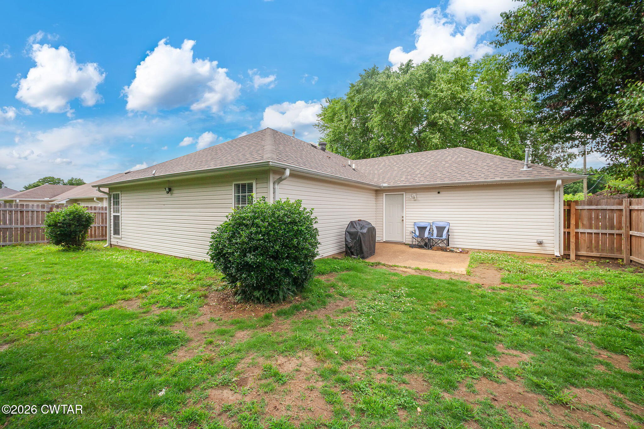80 Rooker Drive Jackson, TN 38305 - Photo 24 of 30 a house view with a garden space