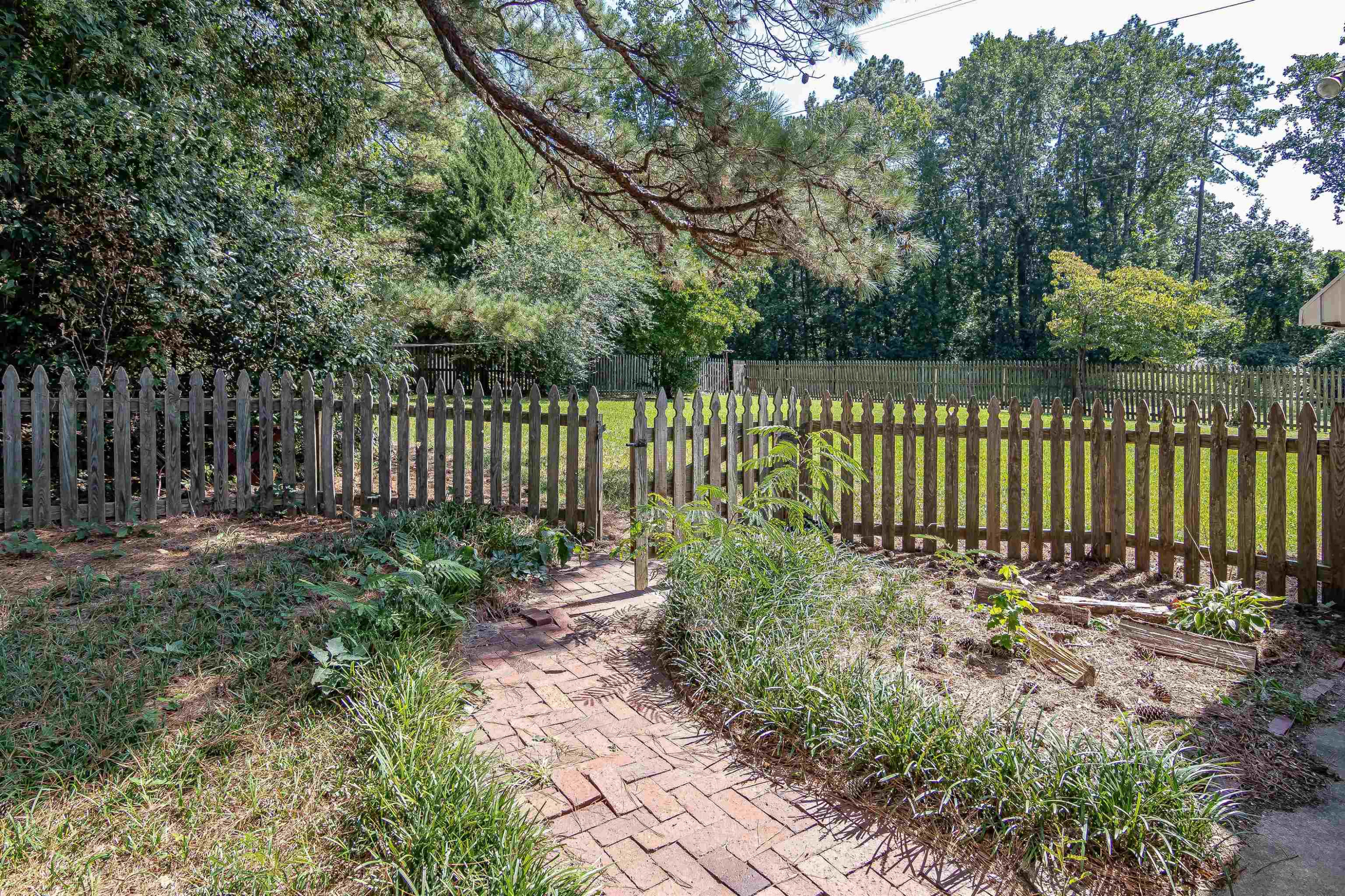 557 Rose Lane Raleigh, NC 27610 - Photo 17 of 23 Picked Fence